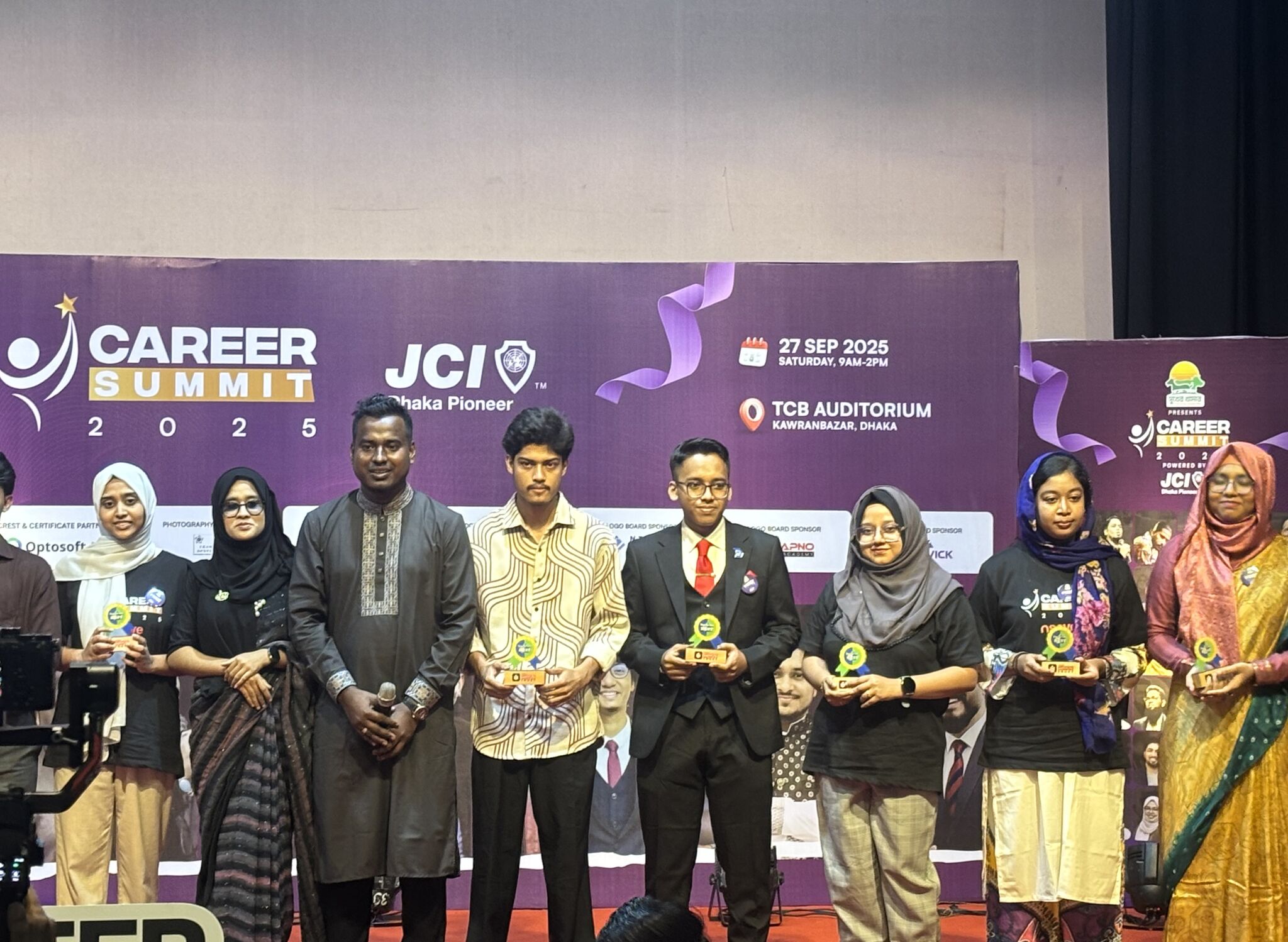 Kazi Fabiha Golam Liya with fellow volunteers at Career Summit 2025