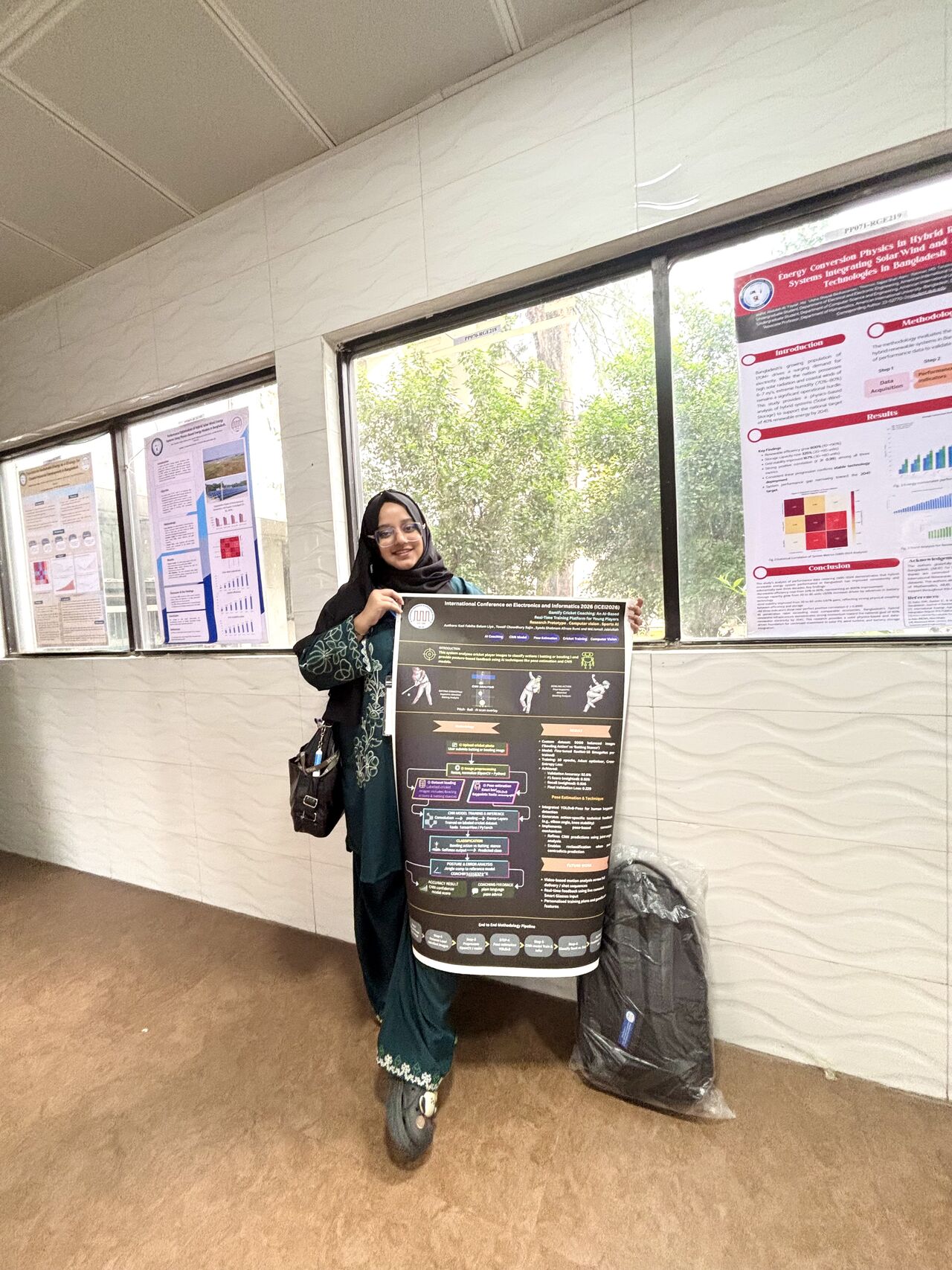 Kazi Fabiha Golam Liya presenting an AI cricket coaching research poster at ICEI 2026